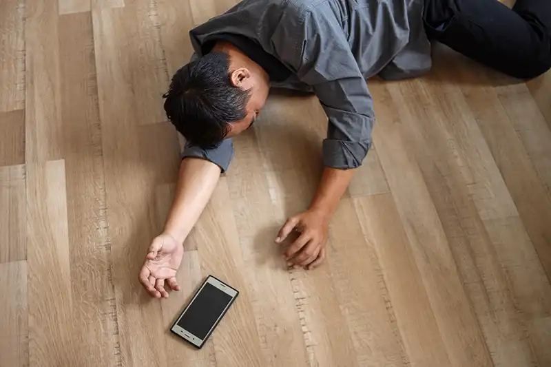 man fainting on the floor